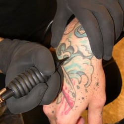 Victim Tattoo & Piercing - Color Tattoo Design