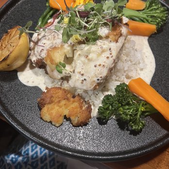 The Cottage - The special for the night- Mahi over jasmine rice- great flavor - New American Near Me - Sarasota, Florida The Cottage - The special for the night- Mahi over jasmine rice- great flavor - New American Near Me - Sarasota, Florida