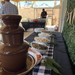 Chocolate Fountain dessert set up and taco man in my backyard by the pool! Chocolate Fountain dessert set up and taco man in my backyard by the pool!