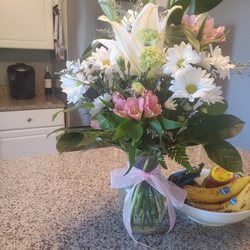 Casey's Garden Shop - What was received with extra charges for more flowers $90