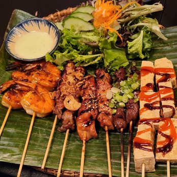 123 Dzo - a plate of food on a banana leaf - Bars Near Me - Laval, Quebec 123 Dzo - a plate of food on a banana leaf - Bars Near Me - Laval, Quebec