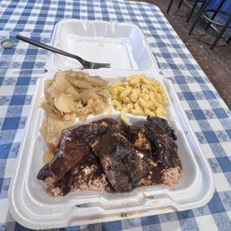 Dark Jerk Chicken with 2 Sides, 2 sides are Mac and cheese and cabbage Dark Jerk Chicken with 2 Sides, 2 sides are Mac and cheese and cabbage