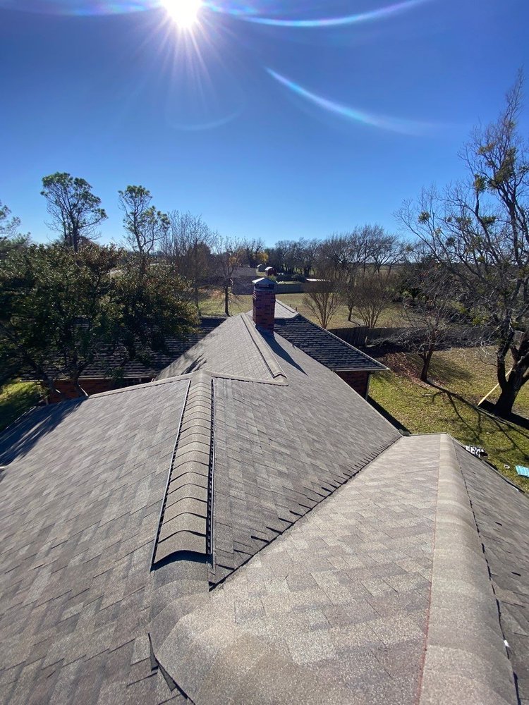 Slide of Absolute Merit Roofing
