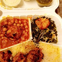 Chicken kabob, with basmati rice, side spinach and chickpeas.
