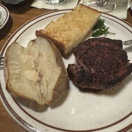 Filet Mignon 8oz. with Baked Potato and garlic bread Filet Mignon 8oz. with Baked Potato and garlic bread