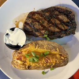 12oz Ribeye, HUGE Baked potato and a generous salad (not pictured)
