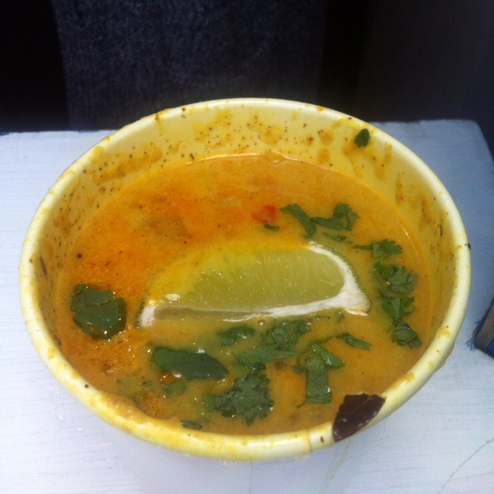 South Indian curried soup. Don't be fooled. Stir this and there is loads of rice. So it's a nice filling portion.