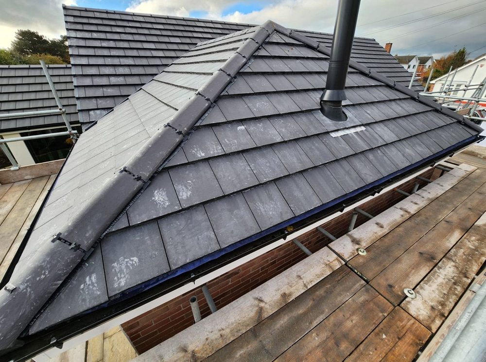 Slide of North Shattuck Roofing