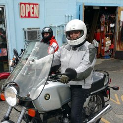 Duncan's Beemers - Jini picking her bike up after winter storage.