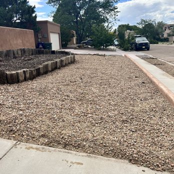 Henry’s Tree Experience - This the after picture of an overgrown yard clean-up. - Landscape Architects or Designers Near Me