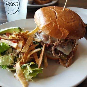The Roost - Roost burger with side avocado salad was amazing. - Bars Near Me - Longmont, Colorado The Roost - Roost burger with side avocado salad was amazing. - Bars Near Me - Longmont, Colorado