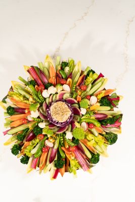 Crudites Platter - Grazed crudité and dips platters feature an abundant assortment of crisp, seasonal vegetables paired with thoughtfully selected gourmet dips. Designed with balance and elegant presentation in mind, each platter highlights freshness, variety, and generous portions throughout. Perfect for gifting, entertaining, and elevated gatherings, our crudité platters offer a refined, vibrant addition to any table. Crudites Platter - Grazed crudité and dips platters feature an abundant assortment of crisp, seasonal vegetables paired with thoughtfully selected gourmet dips. Designed with balance and elegant presentation in mind, each platter highlights freshness, variety, and generous portions throughout. Perfect for gifting, entertaining, and elevated gatherings, our crudité platters offer a refined, vibrant addition to any table.