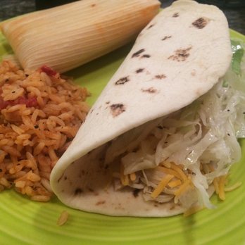 El Pinto - My second plate from the Mexican buffet bar - a chicken soft taco, Mexican rice and a delicious tamale - New Mexican Cuisine Near Me - Albuquerque, New Mexico El Pinto - My second plate from the Mexican buffet bar - a chicken soft taco, Mexican rice and a delicious tamale - New Mexican Cuisine Near Me - Albuquerque, New Mexico