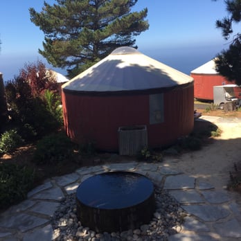 Treebones Resort - Yurt #4 (ours) Partial ocean view. The large wood barrel/fountain is a koi pond. - Resorts Near Me - Big Sur, California Treebones Resort - Yurt #4 (ours) Partial ocean view. The large wood barrel/fountain is a koi pond. - Resorts Near Me - Big Sur, California