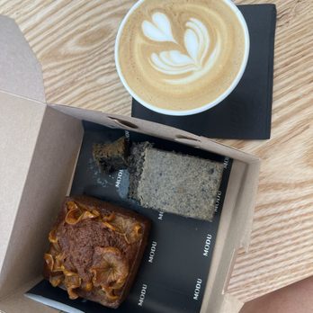 Modu Cafe - Left: kabocha persimmon cake; right: black sesame mochi cake; cappuccino - Coffee & Tea Near Me - Los Angeles, California