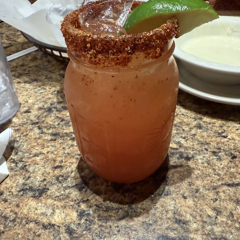 Pancho Villas - Watermelon Paloma with Tajin on the rim - Mexican Near Me - High Point, North Carolina Pancho Villas - Watermelon Paloma with Tajin on the rim - Mexican Near Me - High Point, North Carolina