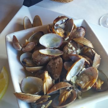 Twisted Fish Steakhouse - Steamed clams in garlic butter broth - Steakhouses Near Me - Seaside, Oregon Twisted Fish Steakhouse - Steamed clams in garlic butter broth - Steakhouses Near Me - Seaside, Oregon