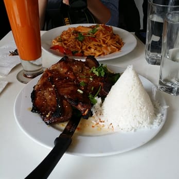 Spice - Grilled Aged Pork Chop and Seafood Spaghetti Drunk Man with Thai Iced Tea - Thai Near Me - New York, New York Spice - Grilled Aged Pork Chop and Seafood Spaghetti Drunk Man with Thai Iced Tea - Thai Near Me - New York, New York