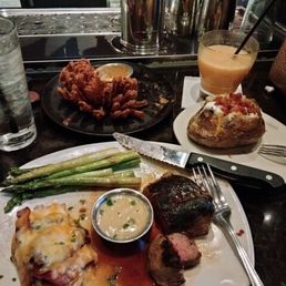 8oz. Sirloin steak with the alive springs chicken, asparagus and loaded baked potato. Blooming onion and a wallaby cocktail. 8oz. Sirloin steak with the alive springs chicken, asparagus and loaded baked potato. Blooming onion and a wallaby cocktail.