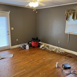 Adams Floor Service - Before - old stain and leftovers from carpet padding.