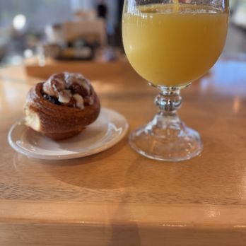 Fredy's Tucan - Cinnamon roll and orange juice.  No refills needed. - Bars Near Me - Puerto Vallarta, JAL