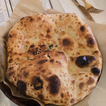 Motek - Wood oven-roasted flat pita - Mediterranean Near Me - Aventura, Florida Motek - Wood oven-roasted flat pita - Mediterranean Near Me - Aventura, Florida