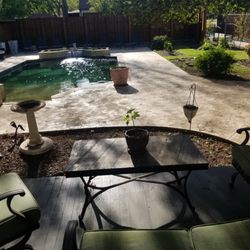The Neathery Estate - A partial view of the backyard from the porch. It is a nice sitting area.