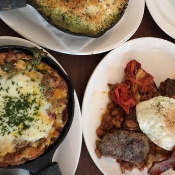 Tilikum Place Cafe - Top - Baked eggs, left - savory Dutch Baby, right - Tilikum Fry Up - New American Near Me - Seattle, Washington Tilikum Place Cafe - Top - Baked eggs, left - savory Dutch Baby, right - Tilikum Fry Up - New American Near Me - Seattle, Washington