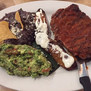 Puerto Vallarta - Steak with black beans, guacamole and plantains - Mexican Near Me - Southington, Connecticut Puerto Vallarta - Steak with black beans, guacamole and plantains - Mexican Near Me - Southington, Connecticut