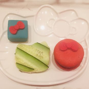 Hello Kitty Cafe - tea service treats and they were good left to right - tea cake, cucumber sandwich and macaroon - Cafes Near Me - Irvine, California