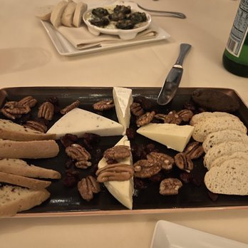 The Republic - a platter of cheese, bread, and nuts - Steakhouses Near Me - College Station, Texas The Republic - a platter of cheese, bread, and nuts - Steakhouses Near Me - College Station, Texas