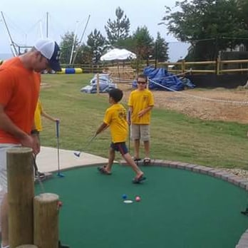 Mr Putty's Fun Park - Playing the green - Mini Golf Near Me - Tega Cay, South Carolina
