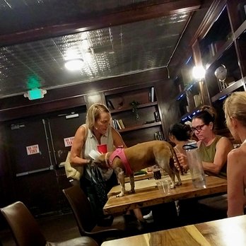 Windmill Food Hall - Customers with dog ON table - Food Court Near Me - Carlsbad, California