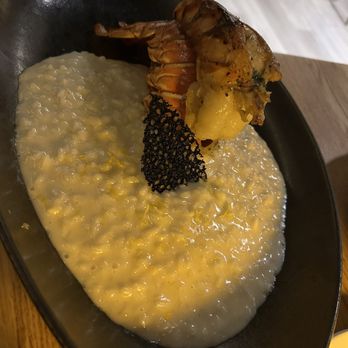 Manzzo Cuisine - ARAGOSTA CON RISOTTO SICILIANO... Herb butter lobster tail with Sicilian lemon risotto. - Italian Near Me - Windermere, Florida