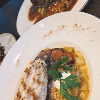Ginos at the Point - Seafood pasta (add lobster tail $40) and the two steak meal in the back - Steakhouses Near Me - Tacoma, Washington