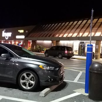 Kroger - a car parked in a parking lot at night - Grocery Near Me - Douglasville, Georgia