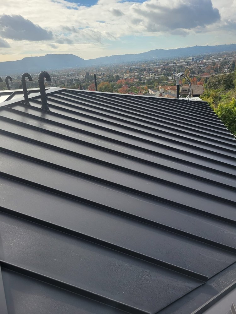 Slide of Tinoco Roofing