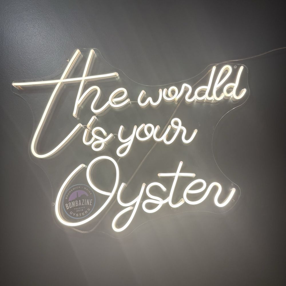 Freeport Oyster Bar - "The World is your Oyster" neon sign - Seafood Near Me - Freeport, Maine