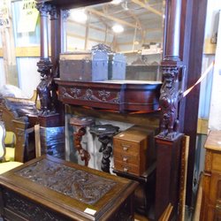 J & E Antiques - Carved griffins - cool!