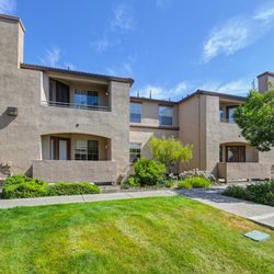 The Bridges at Woodcreek Oaks Apartments - Exterior Lawn and Building Exterior