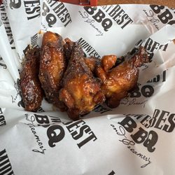 Midwest Best Bbq & Creamery - The "dillonator " wings. Smoked with a lemon pepper dry rub tossed in a sweet bbq