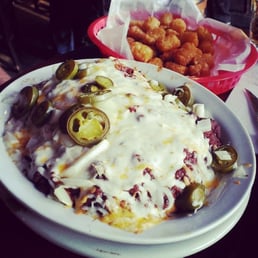The massive chili burger! Its so large the side of tater tots has its own basket. The massive chili burger! Its so large the side of tater tots has its own basket.