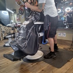 Man Cave - This Wonderful barber was great and patient with my son and even had a conversation with him and made him smile.