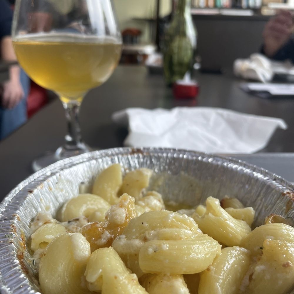 Blind Bat Brewery Bistro - a bowl of pasta and a glass of wine - Brewpubs Near Me - Centerport, New York