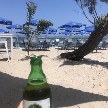 FTLO Travel - Cheers to a relaxing beach day in milos - Travel Services Near Me - El Segundo, California