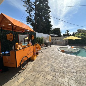 Crystal Bartenders - Bar setup with additional designs through the pool area - Bartenders Near Me