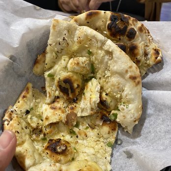 Aroma Indian Cuisine - Cilantro garlic naan - Indian Near Me - Naples, Florida Aroma Indian Cuisine - Cilantro garlic naan - Indian Near Me - Naples, Florida
