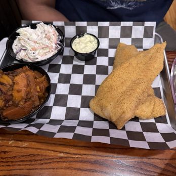Collision Course - Fried fish with creamy coleslaw & candied sweet potatoes - A meal featuring fried fish fillets, coleslaw, potato salad, and a small cup of creamy sauce served on a checkered paper-lined tray. - Breakfast & Brunch Near Me - Westminster, Maryland