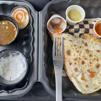 Crest Taco - half eaten birria quesdilla, i need to slow down eating but it's so incredibly tasty - Breakfast & Brunch Near Me - San Diego, California