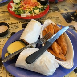 Toot's Restaurant - Fried chicken wrap with Nashville Hot Sauce, sweet potato fries (don't pass on the zippy sauce) and side salad